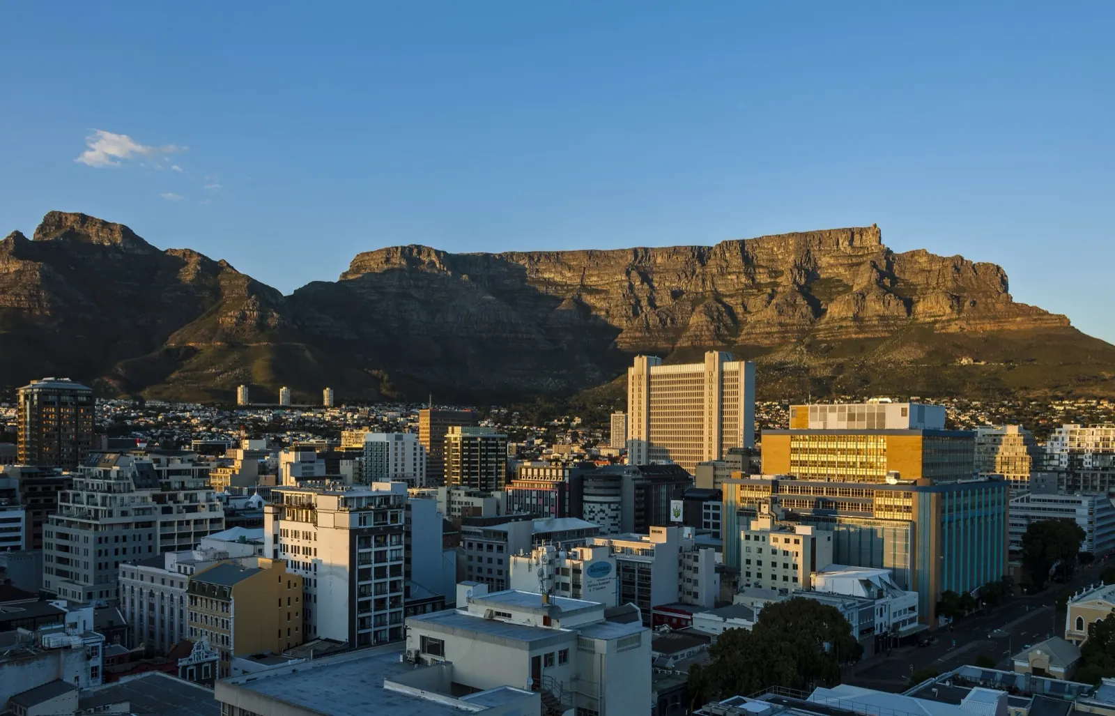Cape Town City Bowl and Table Mountain at dawn, the area TransportPlus routes serve