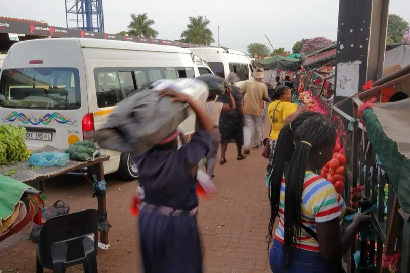 A busy South African taxi rank at the end of the day, the daily commute TransportPlus replaces